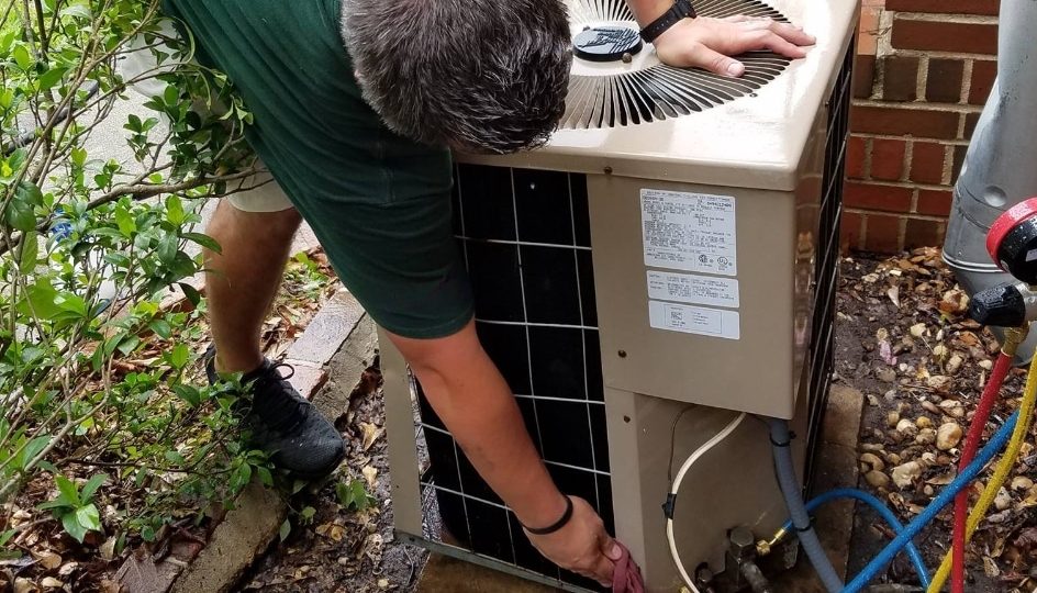 perfect service technician working on hvac unit 2